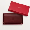International Wallet with Gussets, Must De Cartier – Burgundy Calfskin, Golden Finish – Cartier International Wallet with Gussets, Must De Cartier – Burgundy Calfskin, Golden Finish – Cartier