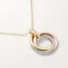 Trinity Pendant, Small Model, Half-Paved